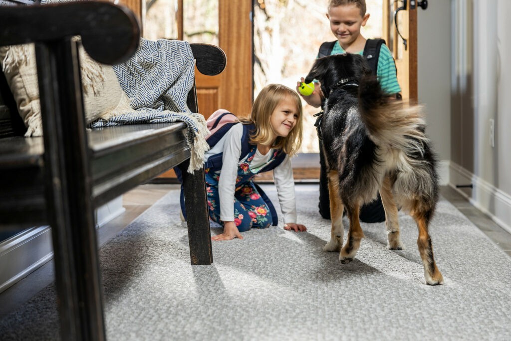 Kids playing with dog | Frazee Carpet & Flooring