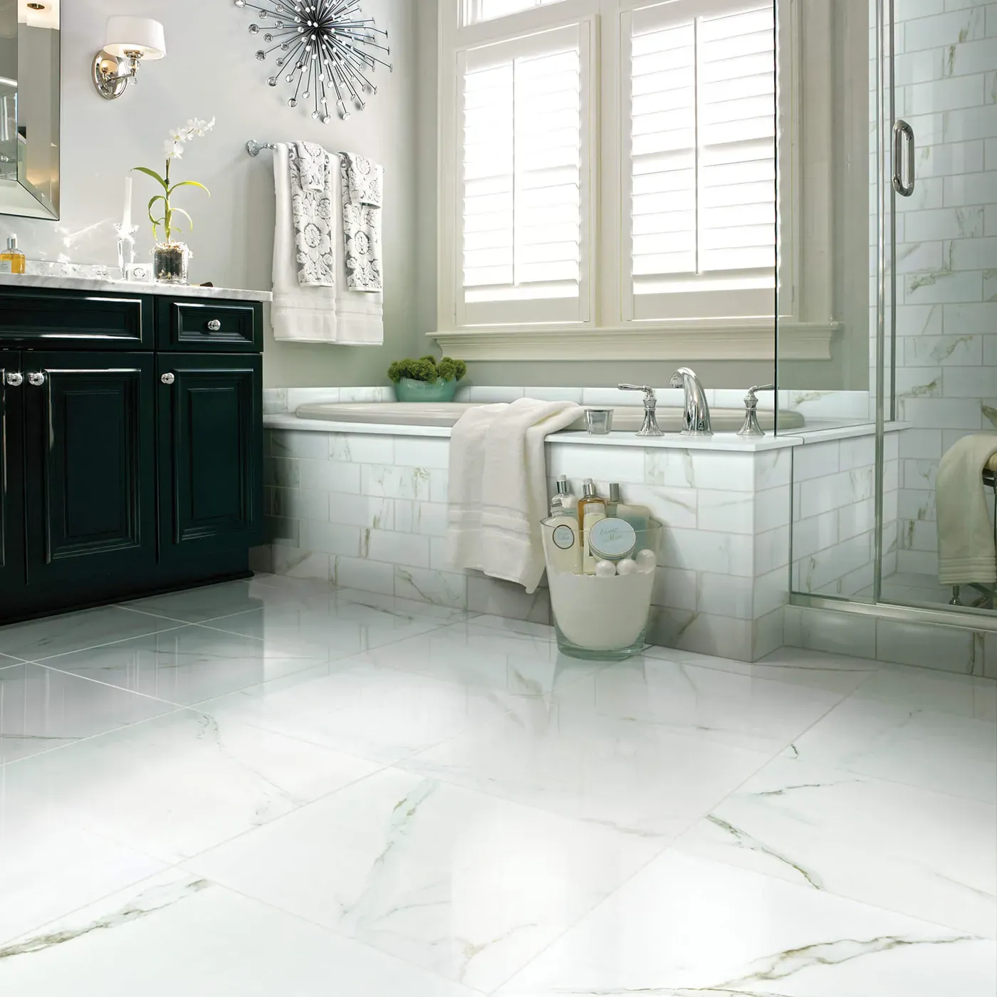 CASINO-POLISHED-CS37V-CASINO4X12-CS35V-CALACATTA-ORO-00121-V Shaw Floors Calacatta Oro polished white marble-look tile in a luxurious bathroom | Frazee Carpet & Flooring